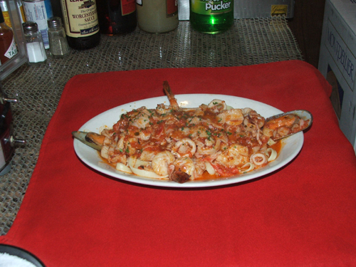 Fetuccini Pescatori with seafood in tomato sauce.