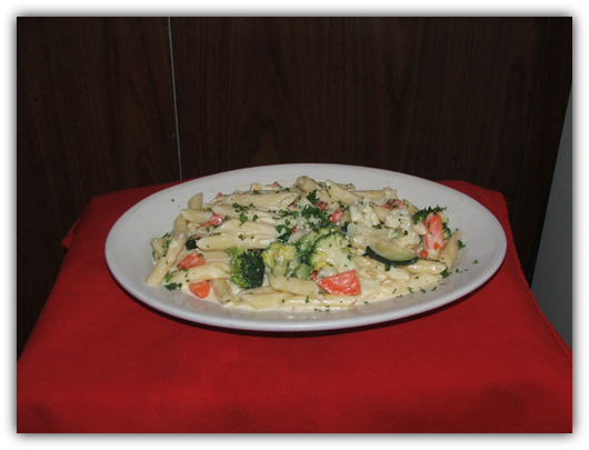 Pasta Napoletana. Choice of pasta with vegetables and cream sauce.